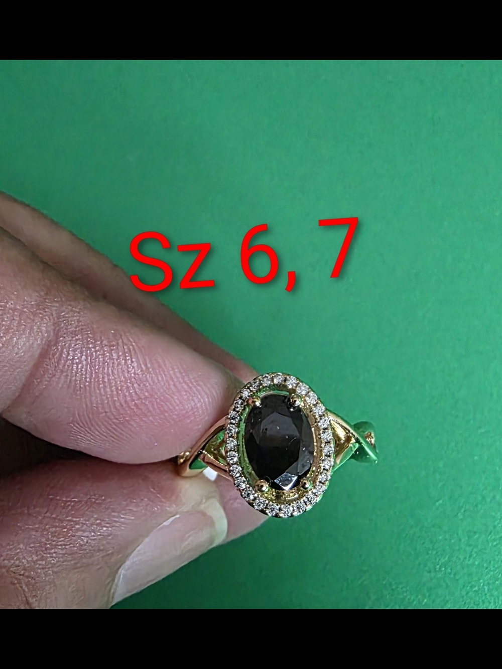 14k Gold Plated Ring with Black Oval Stone and Halo Accents